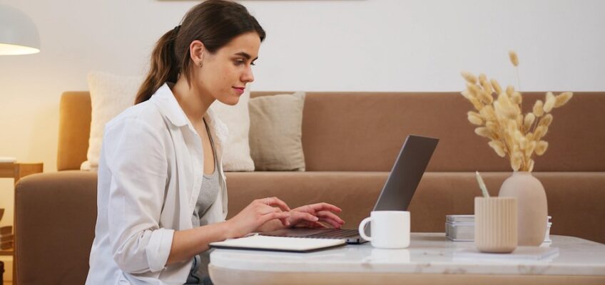 a woman using a laptop