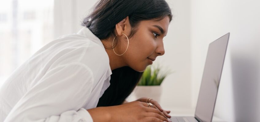 a woman using a laptop